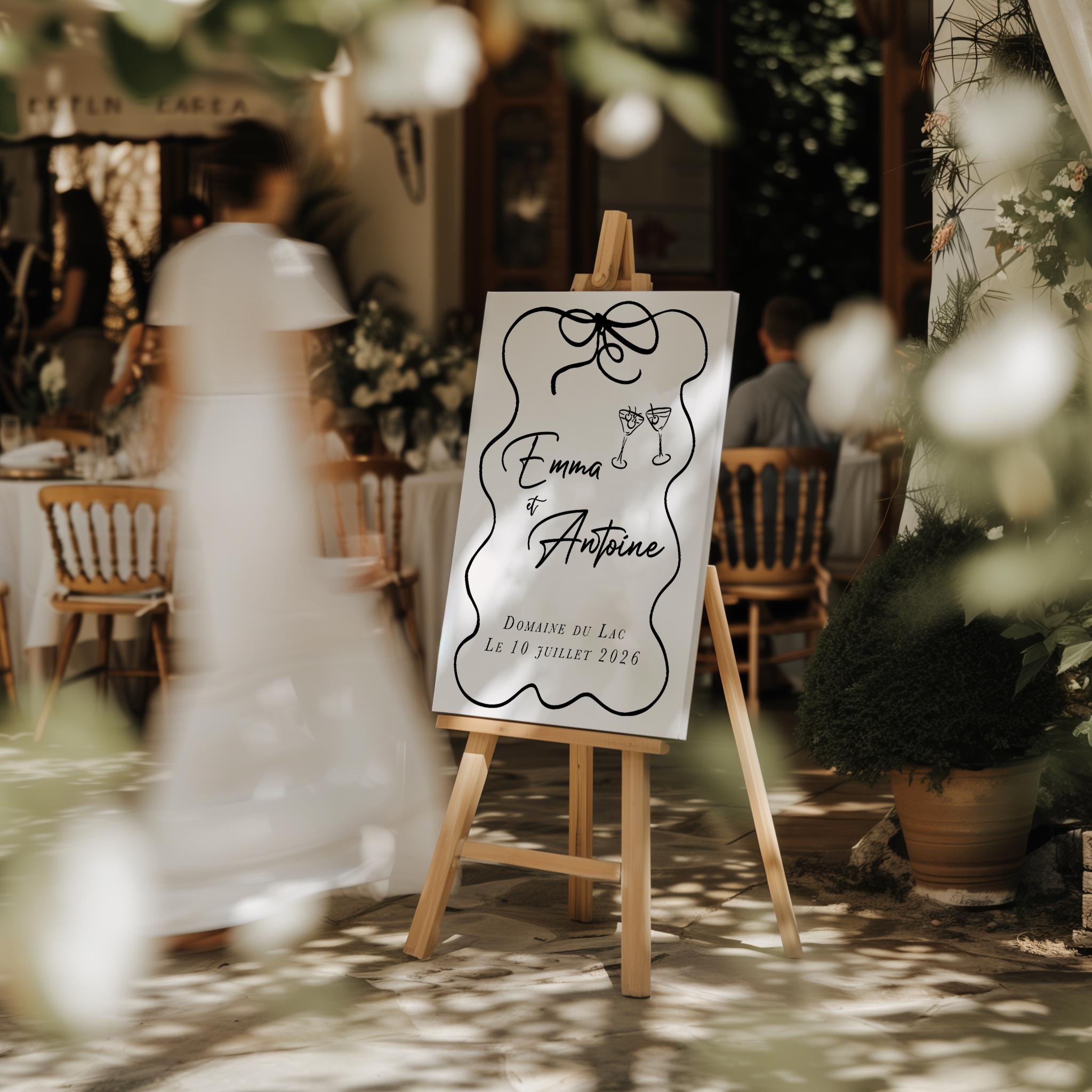 Signalétique mariage forex blanc, texte noir, dessins de nœud et verres à la main