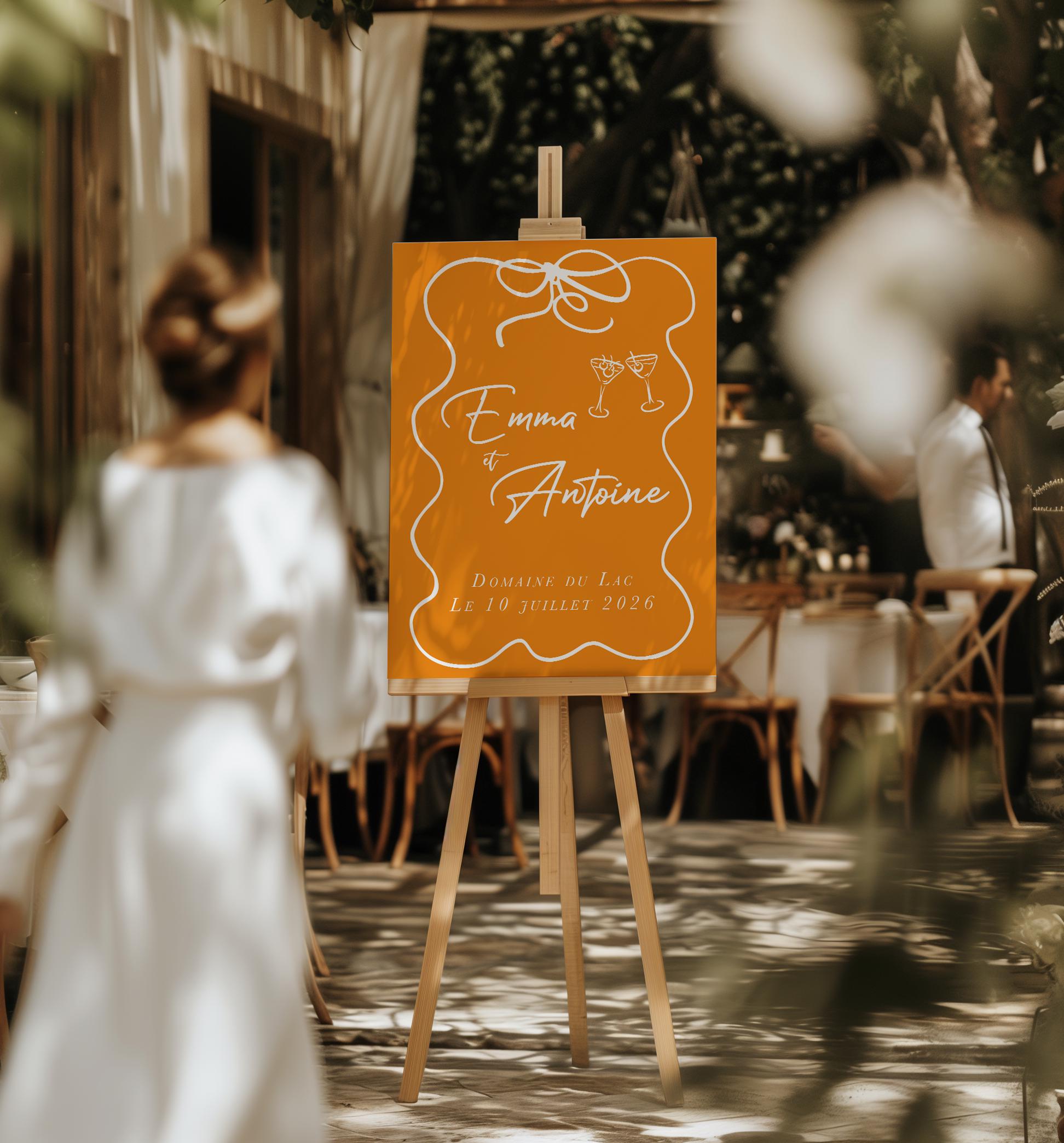 Signalétique mariage forex orange, texte blanc, dessins de nœud et verres à la main