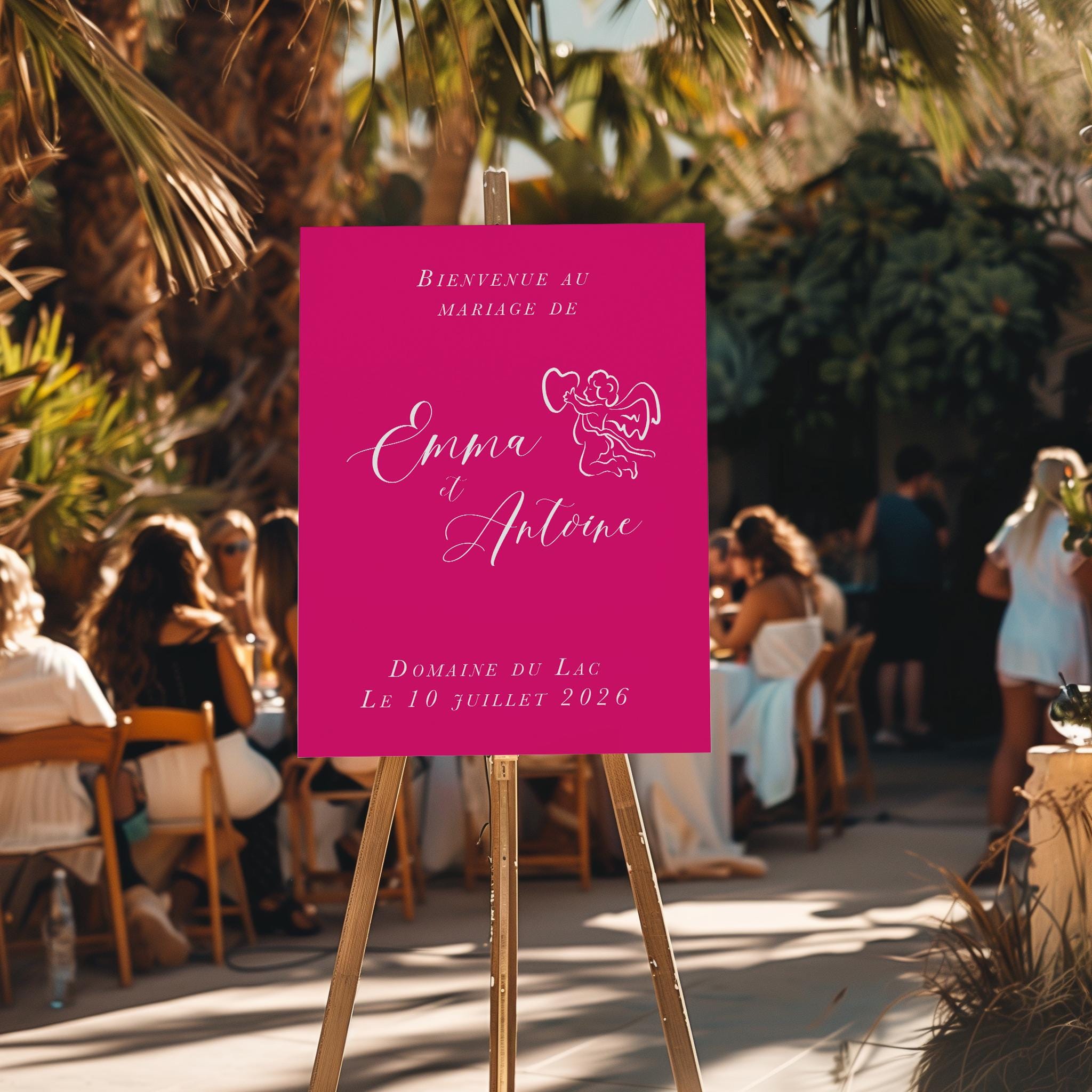 Panneau de bienvenue mariage fond rose vif avec petit ange et calligraphie blanche