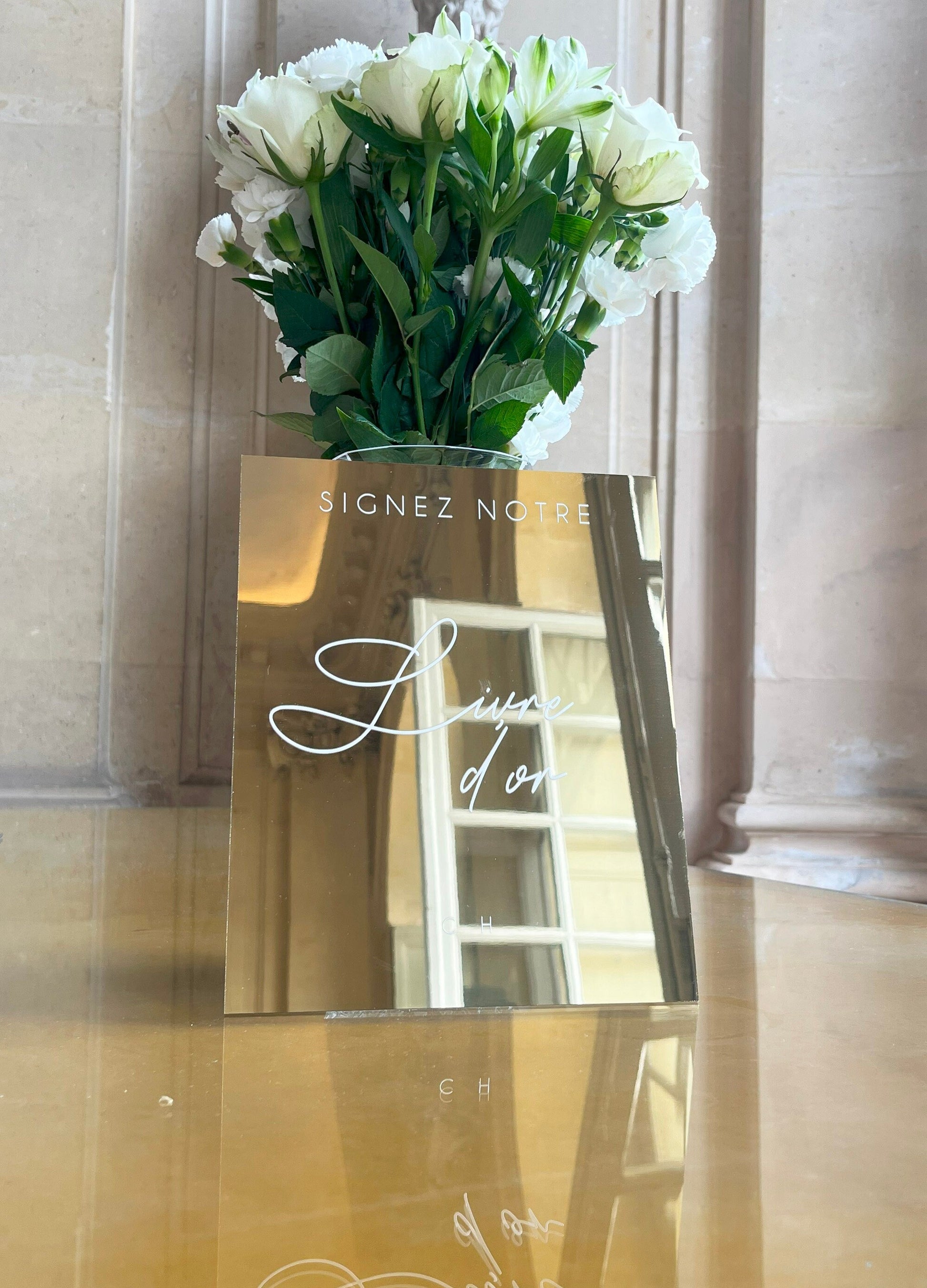 Panneau en miroir doré avec inscription calligraphique pour le livre d'or