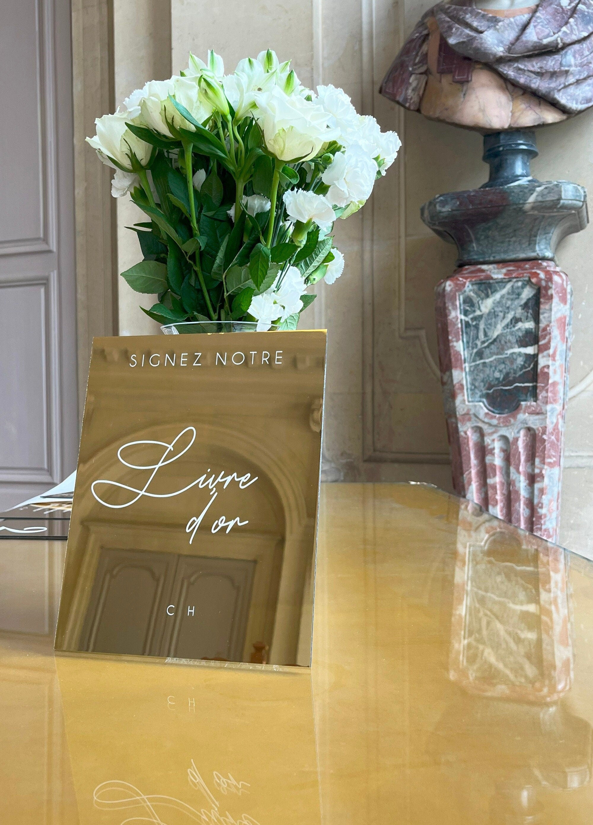 Panneau en miroir doré avec inscription calligraphique pour le livre d'or