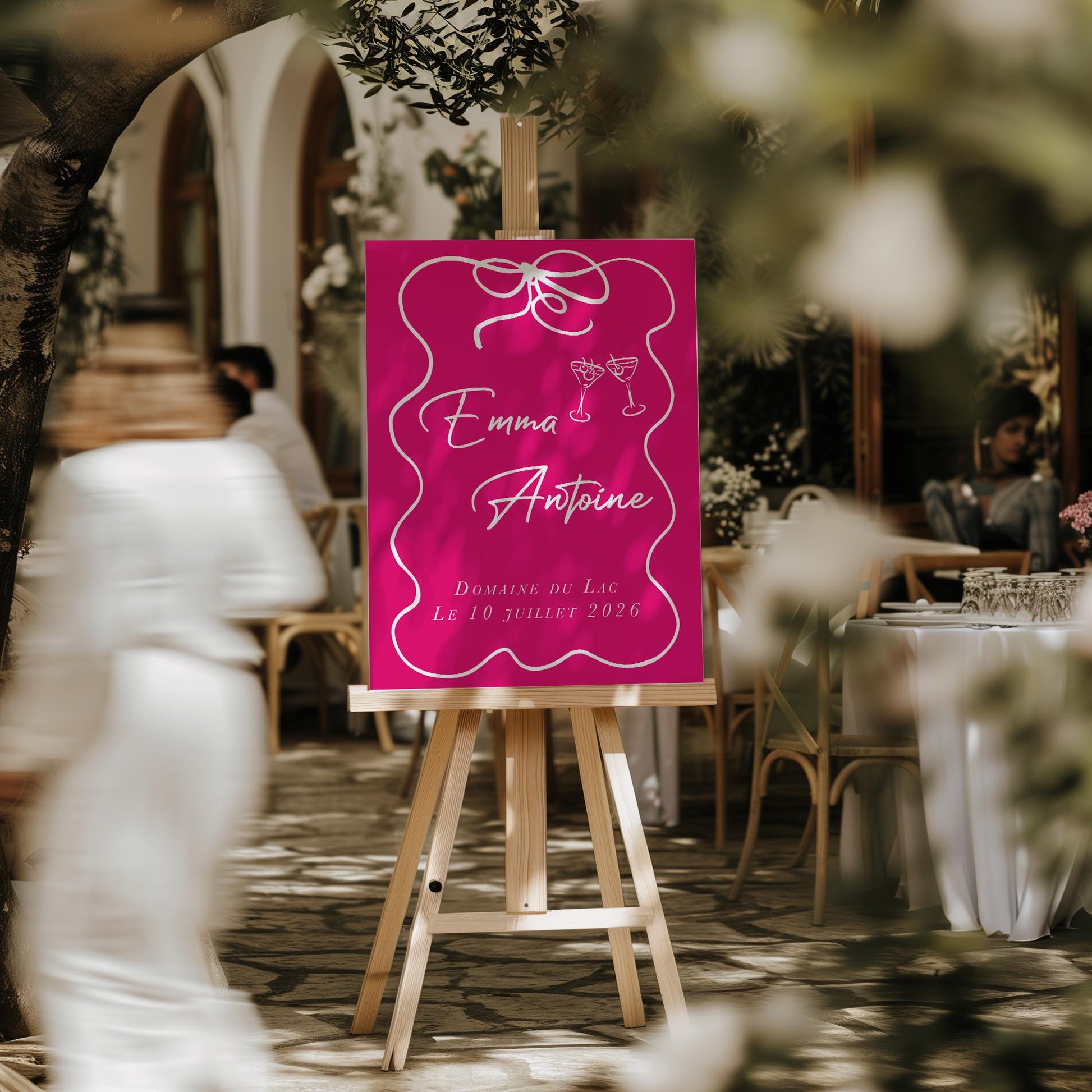 Panneau de bienvenue en forex fond rose vif avec texte blanc, nœud et deux verres dessinés à la main


